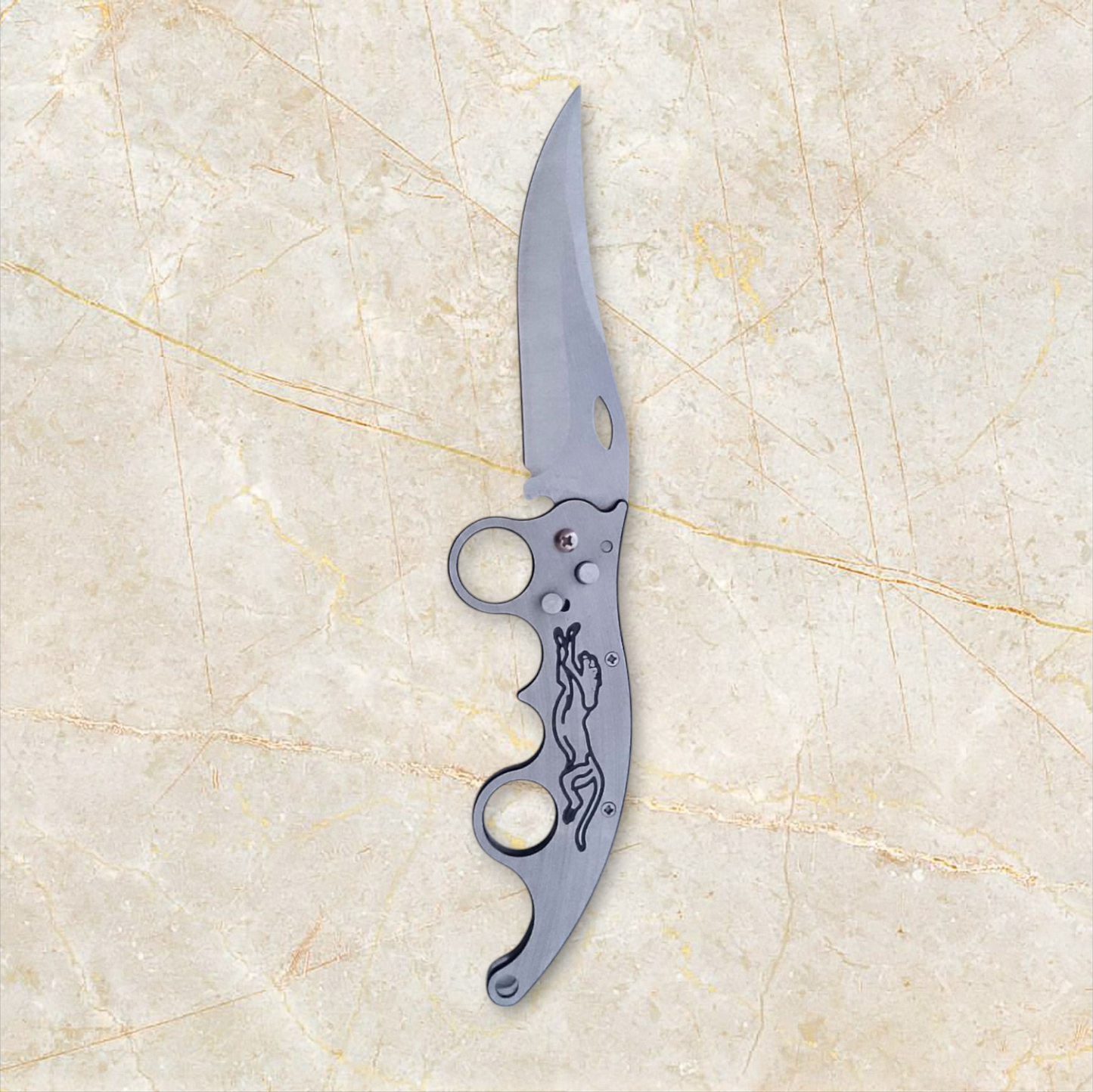 "Button-Activated Folding Knife"