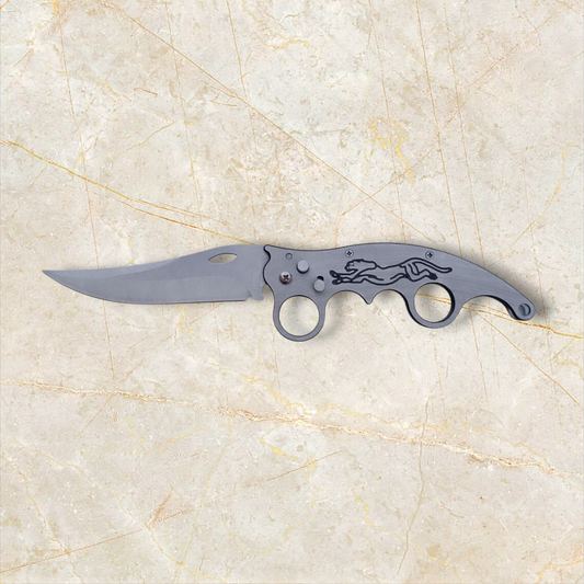 "Button-Activated Folding Knife"
